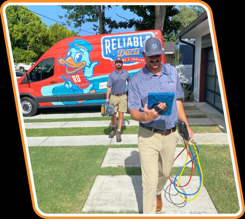 Technician performing maintenance and repair on a residential heat pump