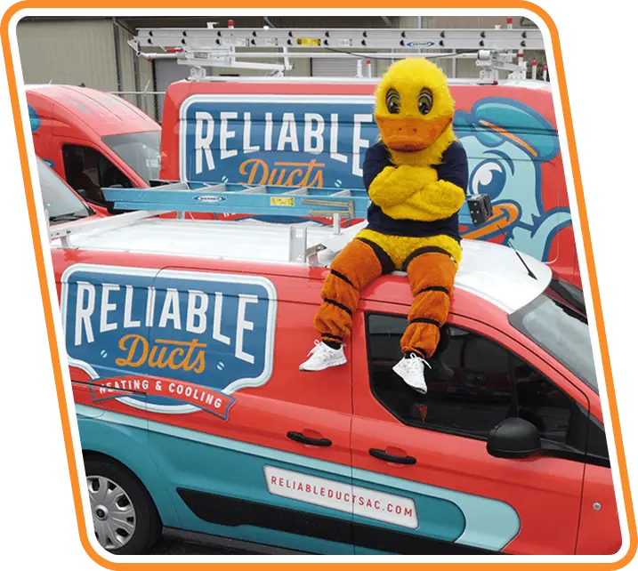 Reliable Ducts Heating and Cooling mascot on a service van in Jacksonville, FL